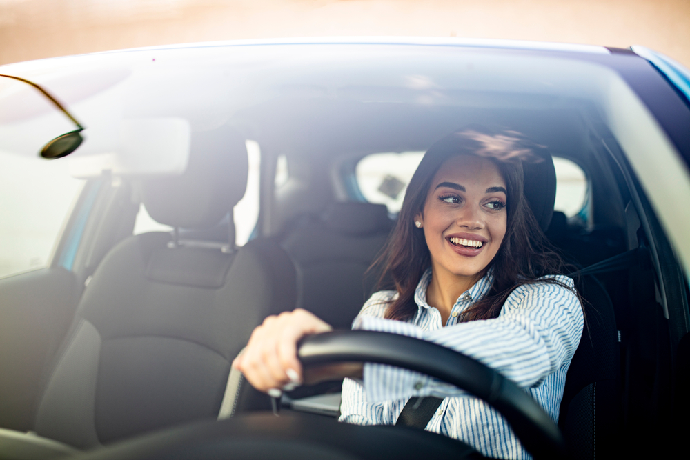 woman driving car.